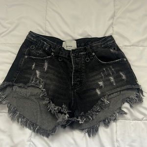 Black One teaspoons size 24.